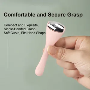 Mini alloy eye cream massage roller with ergonomic pink handle and silver metal head
