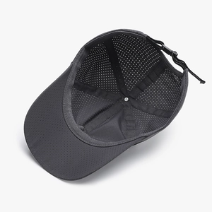 Dark gray breathable quick-dry baseball cap with laser-cut holes and adjustable toggle