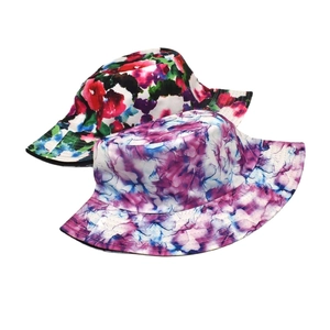 Fashionable floral and tie-dye cotton bucket hats for sun protection and outdoor style