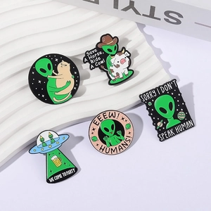 5-piece creative green alien enamel pin set with humorous outer space slogans