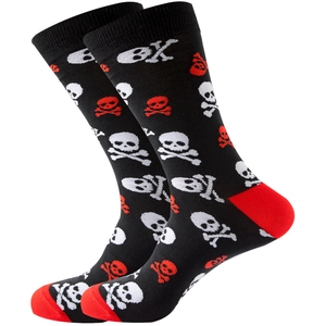 Detail shot of mid-calf socks featuring black fabric with red and white skull patterns