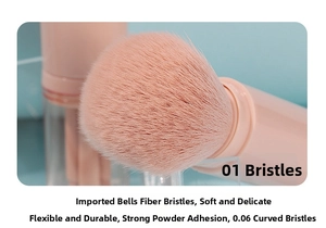 Detailed close-up of soft pink 0.06mm fiber bristles on a round makeup brush head