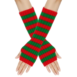 Close-up of red and green striped knit fingerless gloves for Christmas styling