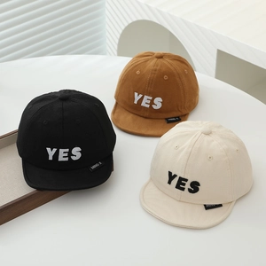 Short brim baby baseball caps with YES embroidery in black brown and cream colors