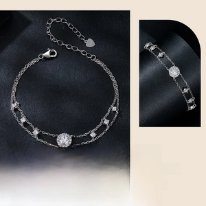 Detailed macro view of S925 sterling silver double-layer bracelet with moissanite gems