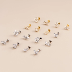 G23 titanium cartilage studs set with gold and silver butterfly and flower designs