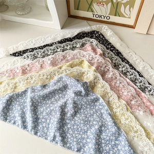 Five floral silk scarves with lace trim in blue, yellow, pink, black, and white colors