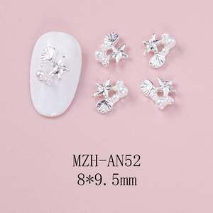 Macro shot of silver starfish and shell nail charms with pearls and 8x9.5mm size info