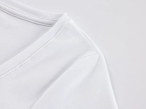 Close-up of white ribbed U-neckline and fine stitching on a slim fit cotton T-shirt