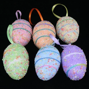 Set of six colorful foam Easter eggs with textured coating and matching satin ribbons