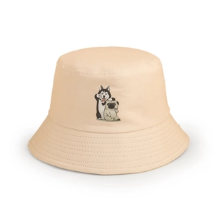 Detail of light beige canvas bucket hat with cute cartoon husky and pug dog embroidery