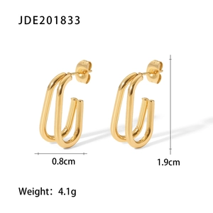 Detail view of 18k gold plated double-layer earrings showing dimensions 1.9cm by 0.8cm