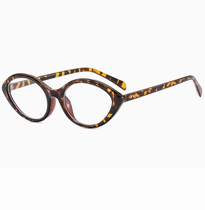 Detailed view of tortoiseshell cat-eye frames with stylish triple stud rivets and clear lenses