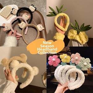 Collection of plush animal hair hoops featuring bear designs and soft floral patterns