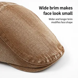 Brown washed cotton flat cap with wide brim and vintage distressed stitching detail