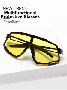 Detail of outdoor sports goggles with large yellow lenses and a matte black frame