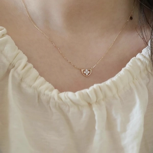 Elegant 925 sterling silver heart necklace with 14k gold finish and floral gemstone inlay