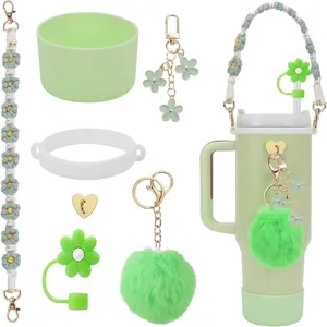 Mint green accessory set for tumbler with woven handle and floral silicone straw cover