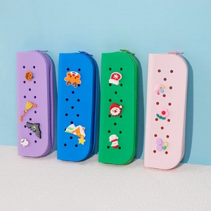 DIY silicone pencil case in hole shoe style with cute cartoon charms in four colors
