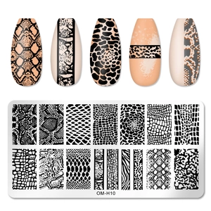 Macro detail of OM-H10 nail stamping plate with leopard and snake animal print textures