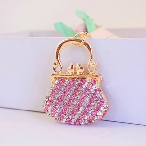 Sparkling crystal-studded handbag keychain charm with pink rhinestones and gold-tone finish
