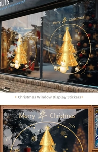 Détail de stickers de Noël dorés pour vitrines avec sapin, bonhomme de neige et texte