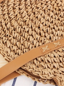 Minimalist round paper rope woven shoulder bag with brown leather strap for beach vacation