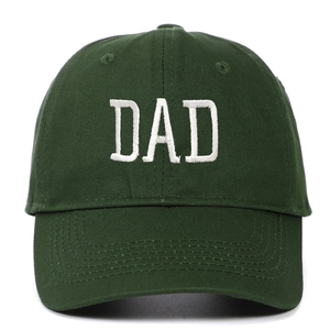 Detailed view of white DAD embroidery on dark green cotton baseball cap texture