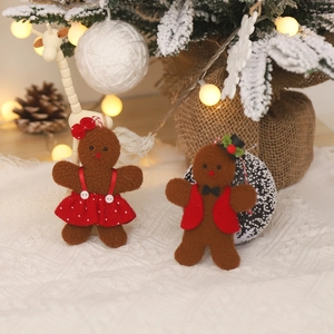 Christmas plush gingerbread man and woman figurines set with festive holiday decorations