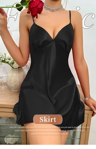 Detail of black satin slip dress showing deep V-neckline and delicate pleated texture