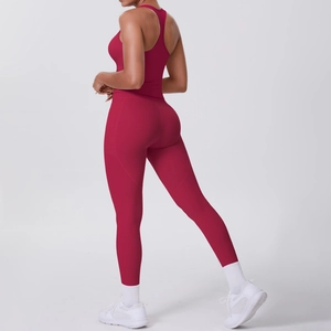 Detail view of burgundy yoga set with racerback top and high waist leggings with side pockets
