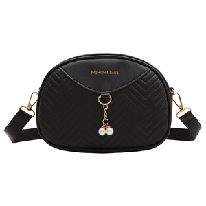Elegant black shell crossbody bag with V-quilted faux leather and pearl pendant details