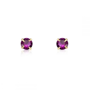 Detailed macro view of round cut magenta zircon stud earrings with gold plating