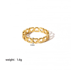 Detailed view of a 0.5cm hollow heart stainless steel ring weighing 1.6g in gold finish