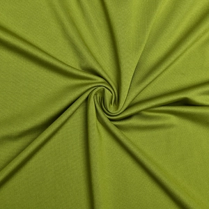 Détail de la texture du tissu élastique vert doux avec effet de drapé plissé chic
