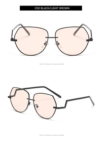 Detail of pilot sunglasses with black frames, light brown lenses and zigzag temples