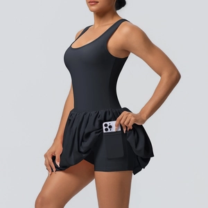 Detail of black tennis dress with built-in safety shorts and functional phone pocket