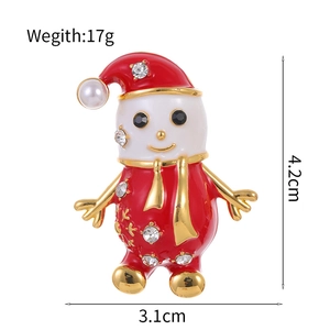 Sparkling rhinestone Christmas snowman brooch with red enamel and pearl accents