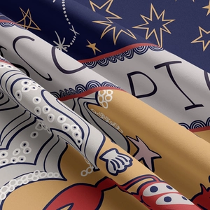 Detailed macro view of celestial zodiac tapestry fabric with golden stars and crab motif