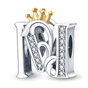 Detail of silver letter M bead with crystal pave and gold crown for DIY bracelet