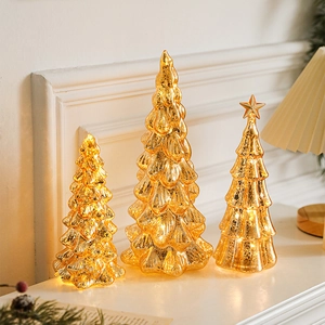 Three-piece set of gold lighted glass Christmas tree table decorations with warm LED glow