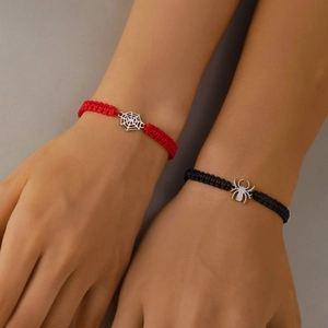 Handmade woven spider web bracelets for couples in red and black cotton cord