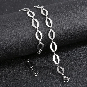 Close-up of silver stainless steel oval link chain necklace with lobster clasp