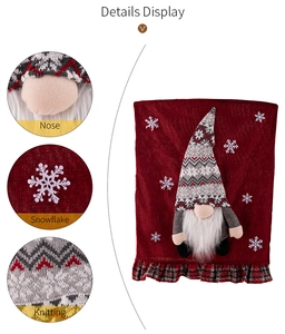 Detail of Christmas gnome chair cover showing plush nose and snowflake pattern textures