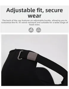 Close-up of adjustable metal buckle on back of black cotton baseball cap for men