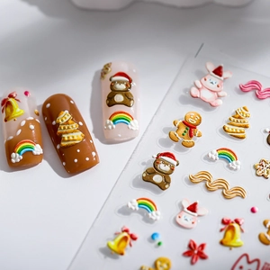 3D embossed Christmas nail stickers featuring cute cartoon bears and gingerbread man