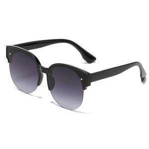 Retro round cat-eye semi-rimless sunglasses with black frame and gradient purple lenses