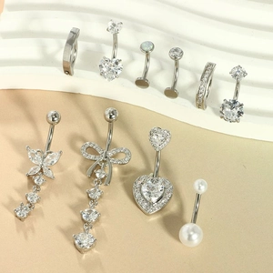 10-piece silver belly piercing set with pink accents and butterfly zircon pendants