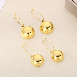 Minimalist long golden stainless steel drop earrings with sleek hollow hemisphere charms