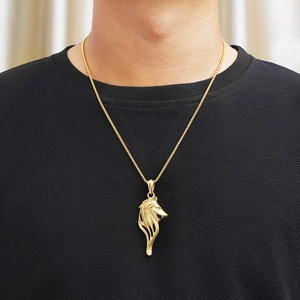 Men's vintage viking wolf head pendant necklace in gold finish worn by model